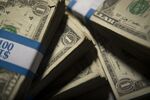 Stacks of U.S. one-dollar bills.