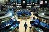 NEW YORK, NEW YORK - MARCH 20: Traders work on the floor of the New York Stock Exchange (NYSE) on March 20, 2020 in New York City. Trading on the floor will temporarily become fully electronic starting on Monday to protect employees from spreading the coronavirus. The Dow fell over 500 points on Friday as investors continue to show concerns over COVID-19. (Photo by Spencer Platt/Getty Images)