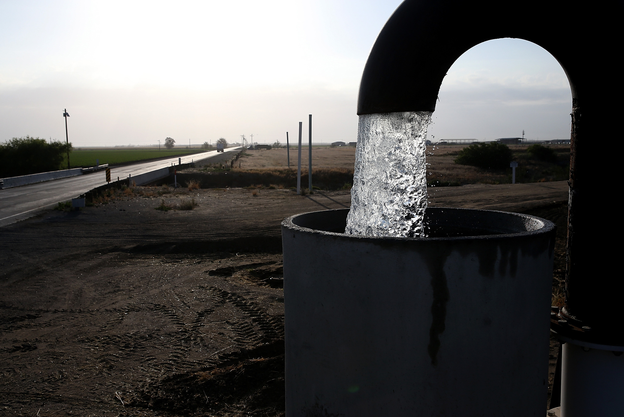 Well water is pumped from the ground in April 2015 in Tulare, California. 
