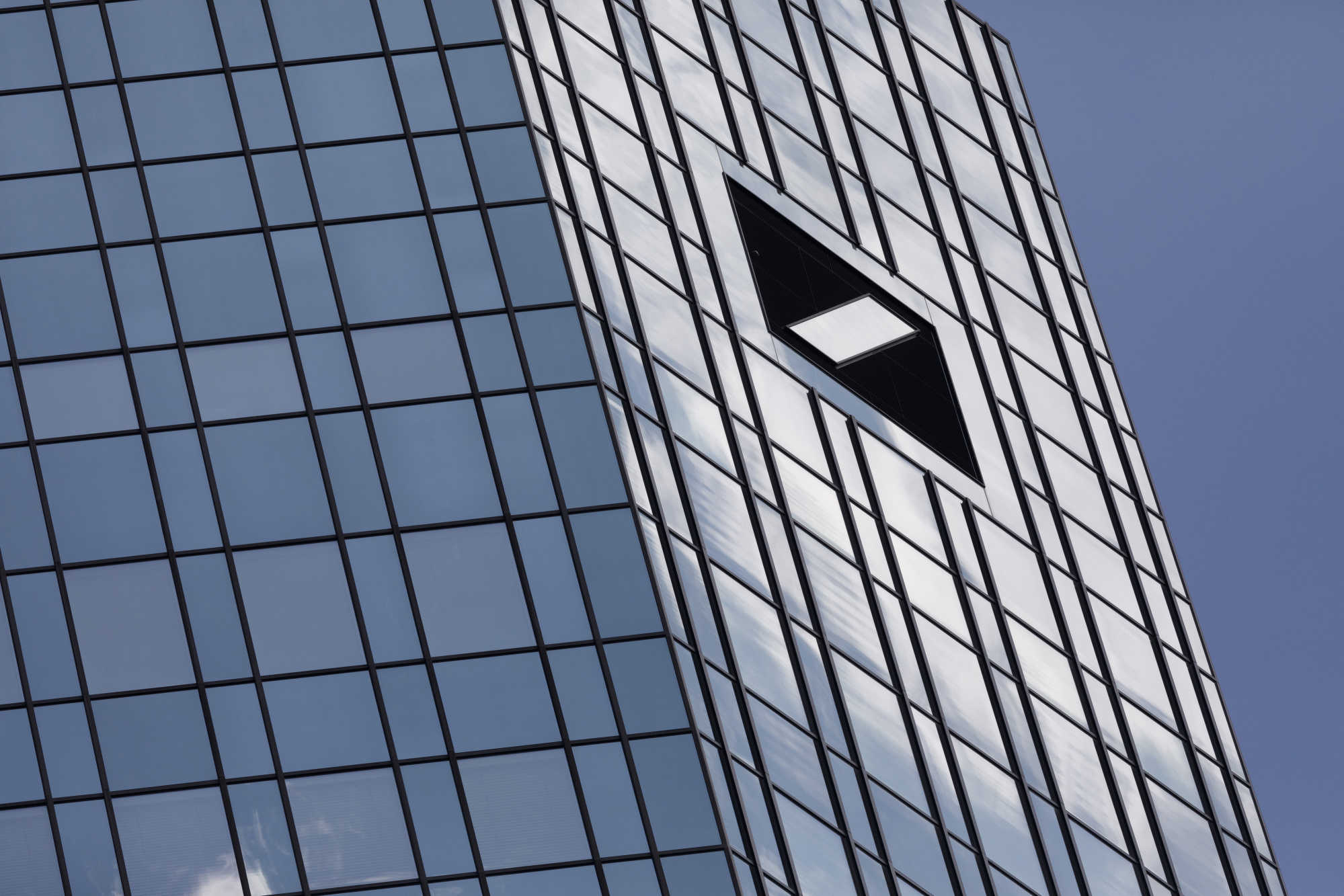 The Deutsche Bank AG logo sits on the bank's headquarters in Frankfurt, Germany, on Wednesday, July 25, 2018.