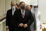 Secretary of State Mike Pompeo walks into a meeting with the Taliban's peace negotiation team in Doha, Qatar,&nbsp;Nov. 21.