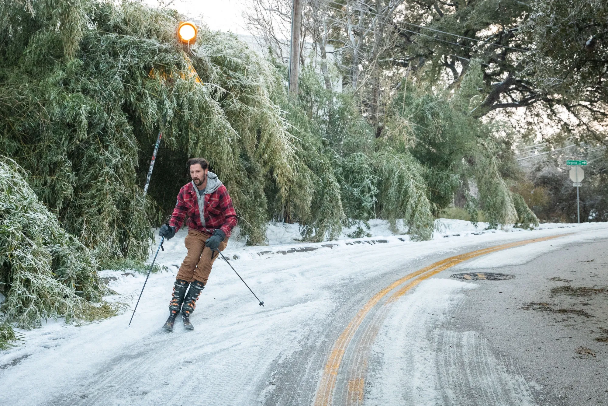 Skiing down a road in Austin, Texas, on Feb. 18