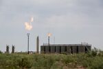 Methane gas is flared just off U.S. Route 285 near Carlsbad, New Mexico, on Tuesday, Aug. 6.