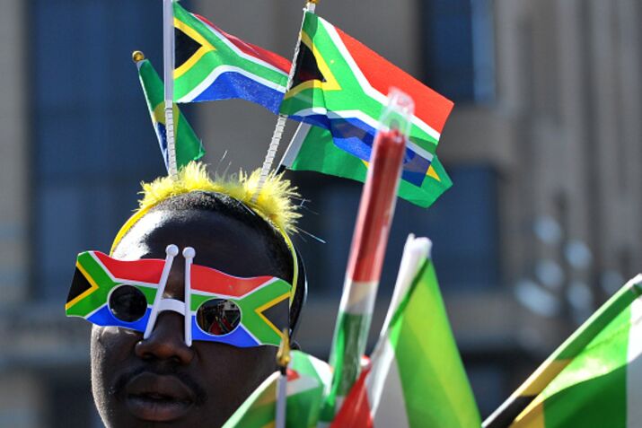 A South African street vendor selling fl