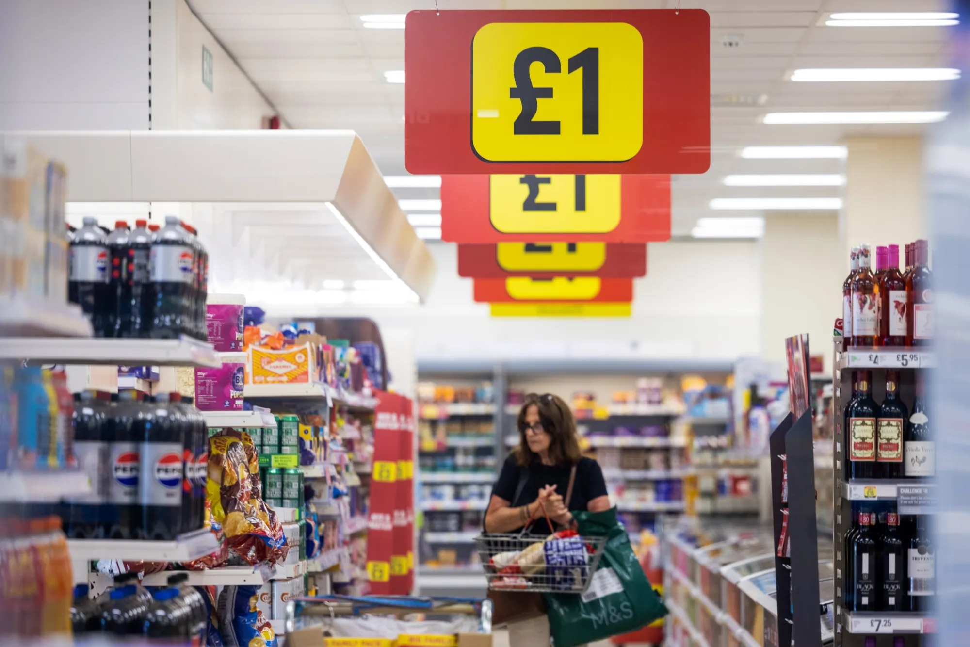 Price banners inside a supermarket in Ipswich.