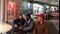 People wait outside the Tesla store at a mall in Short Hills, New Jersey.