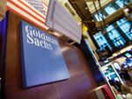 Goldman Sachs Group Inc. signage is displayed at the company's booth on the floor of the New York Stock Exchange (NYSE) in New York, U.S., on Tuesday, May 30, 2017. U.S. stocks halted a seven-day advance, while the dollar fluctuated as data showing a rebound in consumer spending offset a wider selloff in commodities. The euro slipped with equities in the region.