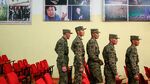 Mongolian soldiers stand in a polling booth after voting in the Mongolian parliamentary election in Ulan Bator on June 29, 2016. Mongolians headed to the polls on June 29 to elect a new national government as the country struggles to monetise its vast natural resources amid slumping demand for commodities from its largest trade partner China. / AFP / BYAMBASUREN BYAMBA-OCHIR (Photo credit should read BYAMBASUREN BYAMBA-OCHIR/AFP/Getty Images)
