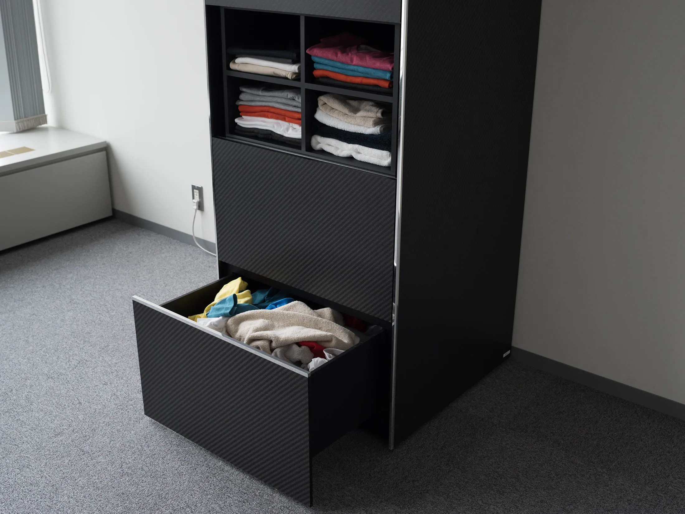 A prototype of a Laundroid laundry folding bot developed by Seven Dreamers Laboratories.
