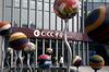 A fountain stands outside a China International Capital Corp. (CICC) securities brokerage branch in Beijing, China, on Tuesday, July 5, 2016. CICC said in a statement it was in "very preliminary" discussions with China Investment Securities Co. on "strategic cooperation and business opportunities" and it wasn't certain that a transaction would proceed.