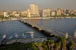 Traffic drives along a bridge spanning the river Nile, in Cairo, Egypt.
