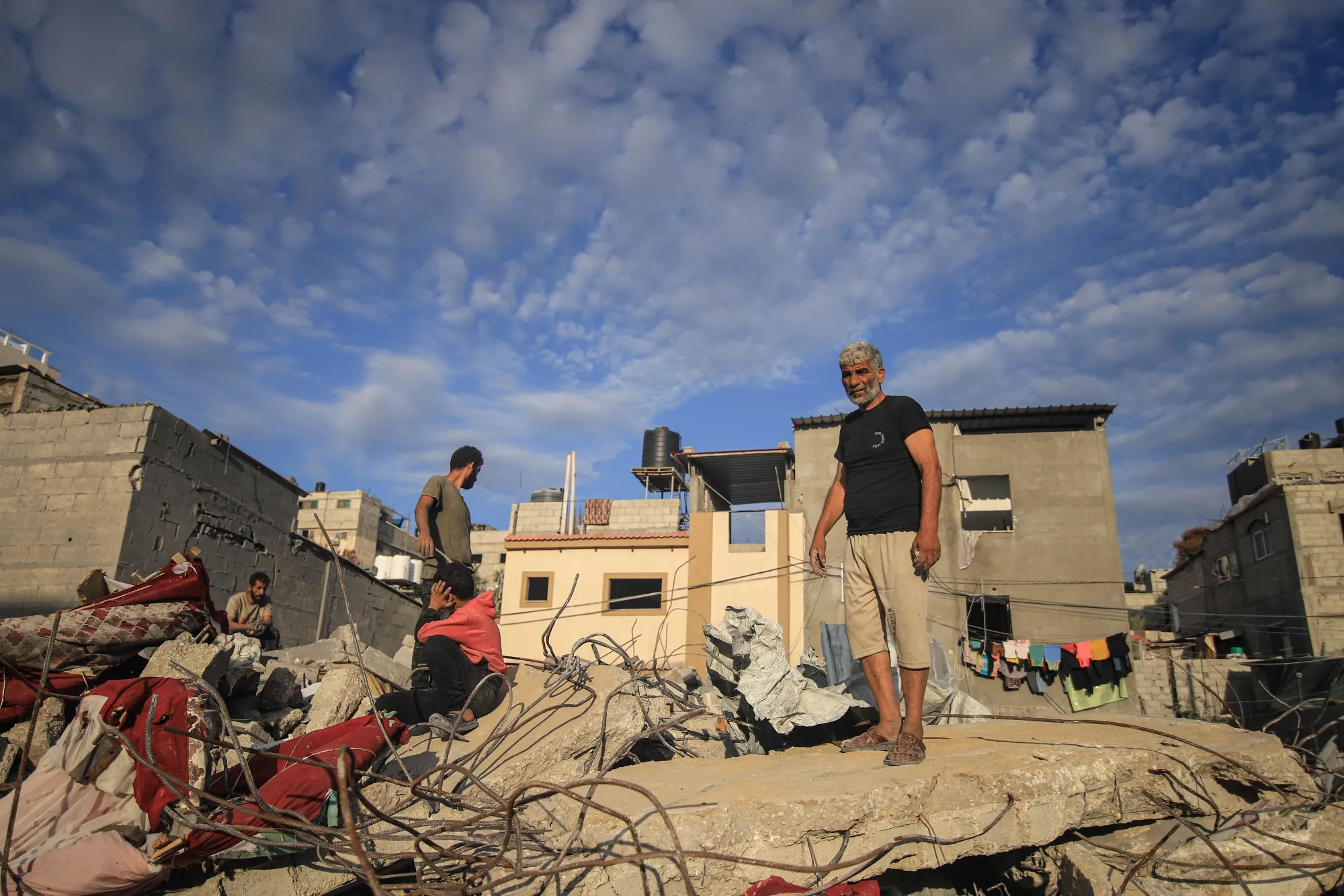 Palestinians in the rubble of destroyed buildings hit by Israeli missiles in the center of Khan Younis, southern Gaza, on Monday, Oct. 30, 2023. The proliferation of deepfake images on social media has raised doubts about real images.&nbsp;