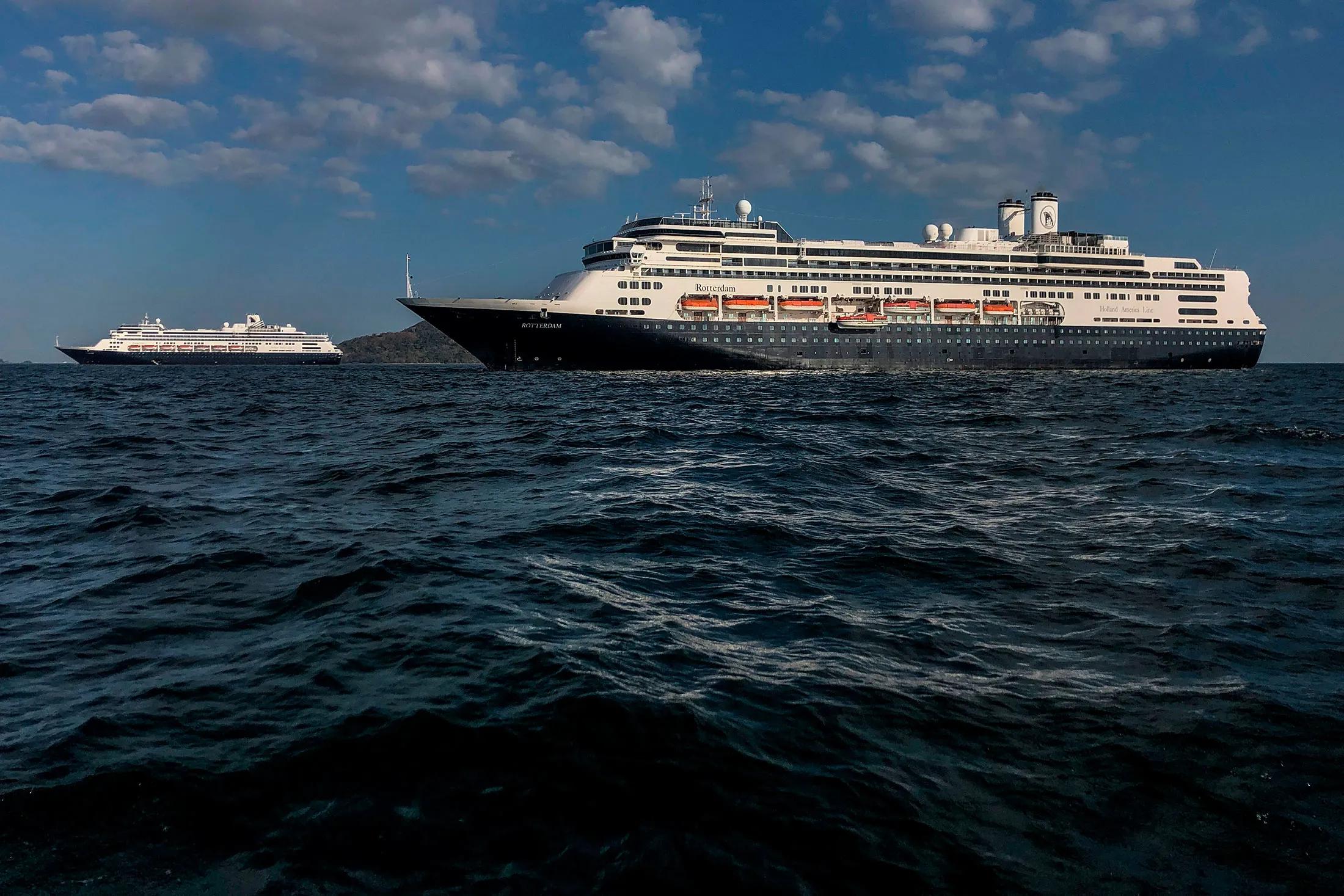 Holland America's cruise ships, the Zaandam, left,&nbsp;and the Rotterdam,&nbsp;are seen in Panama City bay on March 28.&nbsp;