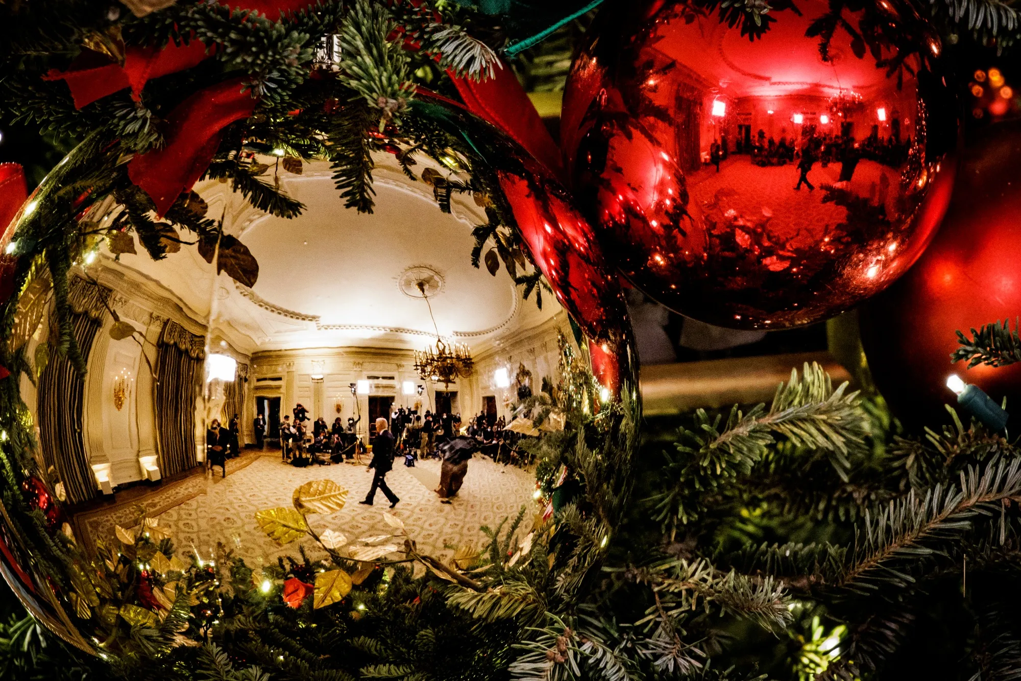 U.S. President Joe Biden is reflected in an&nbsp;ornament at the White House on&nbsp;Dec. 21, 2021.&nbsp;