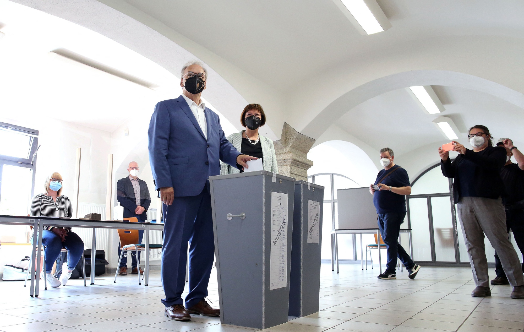Reiner Haseloff casts his ballot for state elections in Saxony-Anhalt.