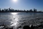 Ice floats in the Hudson River as the skyline of New York City is seen from New Jersey on Jan. 31.