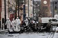 Police And Forensics Attend Scene After Car Bomb At Londonderry Courthouse