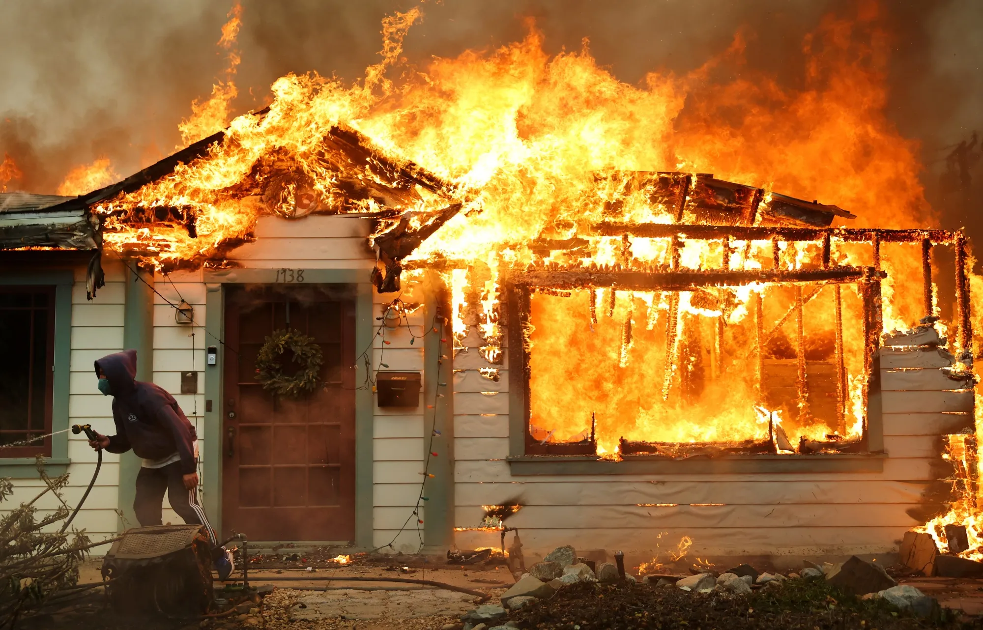Fighting a wildfire with a garden hose is an apt climate change metaphor.