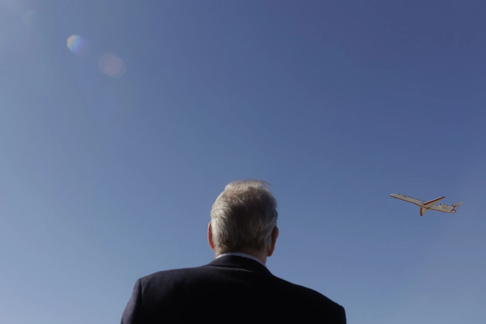 JSX Chief Executive Officer Alex Wilcox&nbsp;watches a JSX airplane take off at Dallas Love Field Airport on Feb. 1.