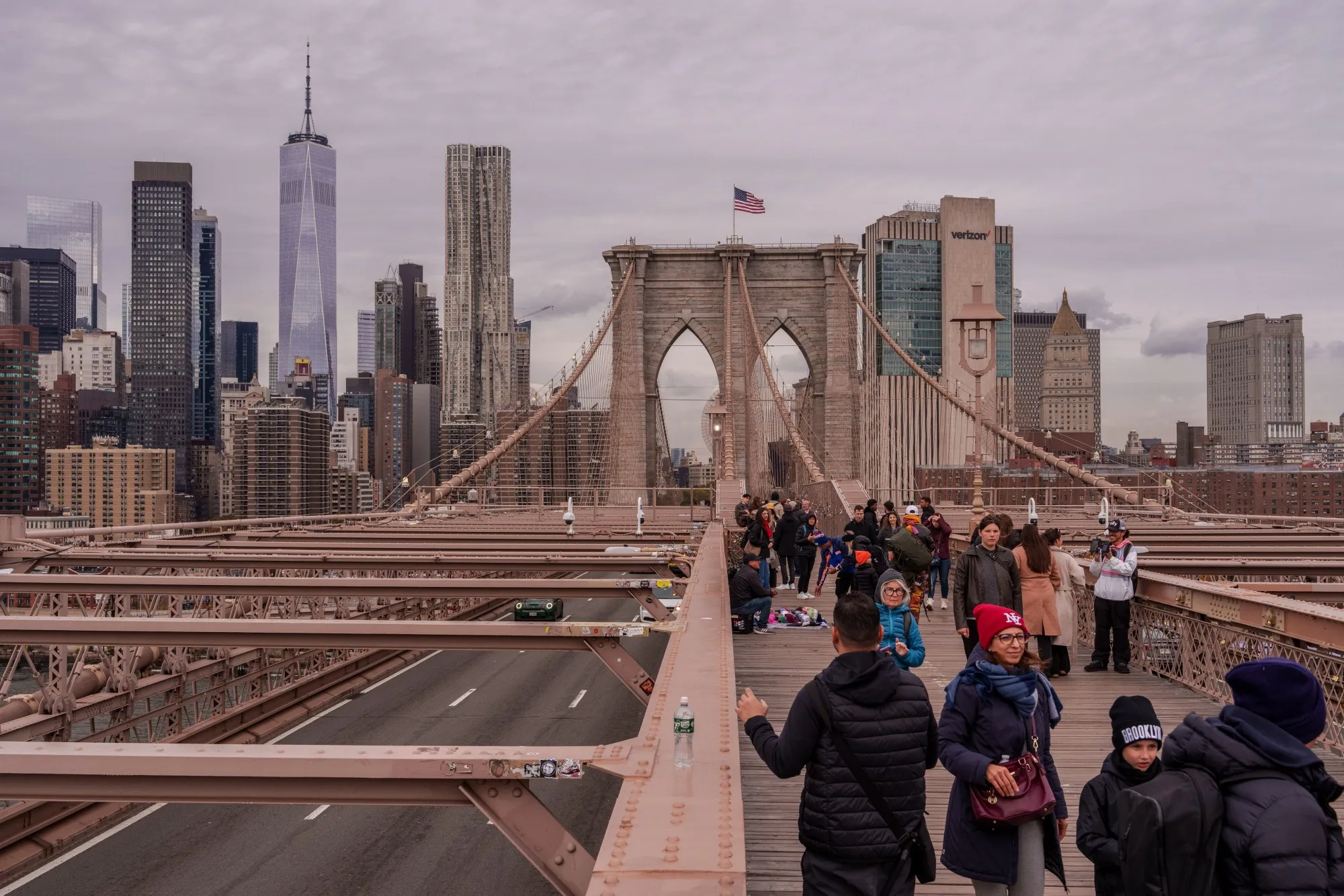 Pedestrians on the Brooklyn Bridge in New York.