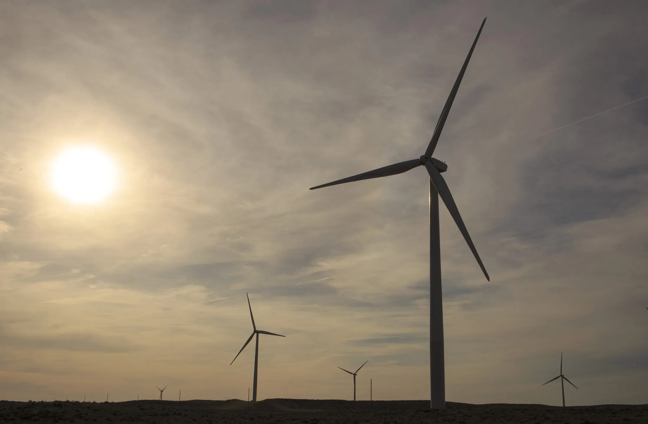 Turbines stand at the Colorado Highlands Wind Farm in Fleming, Colorado, U.S., on Thursday, May 5, 2016. Wind technicians are forecast to be the country's fastest-growing occupation through 2024, outpacing health care and technology fields, according to the U.S. Bureau of Labor Statistics.
