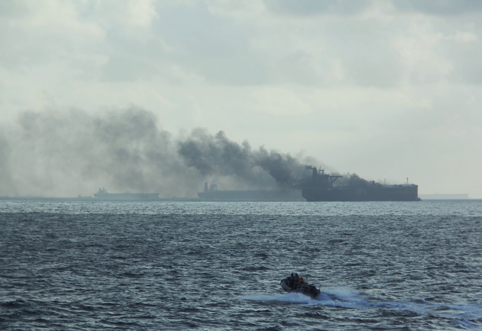 Vessels on fire near Singapore.