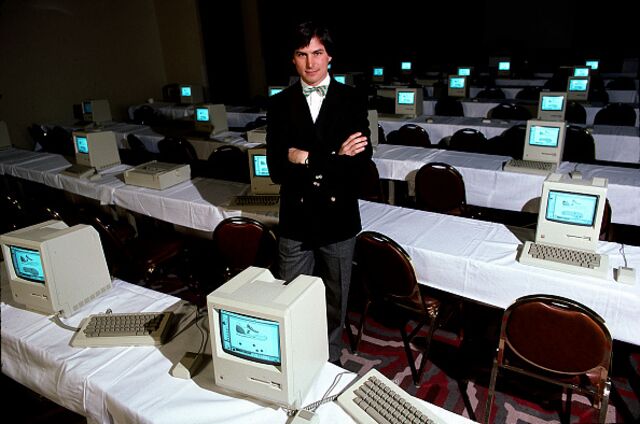 Steve Jobs with the original Macintosh. 