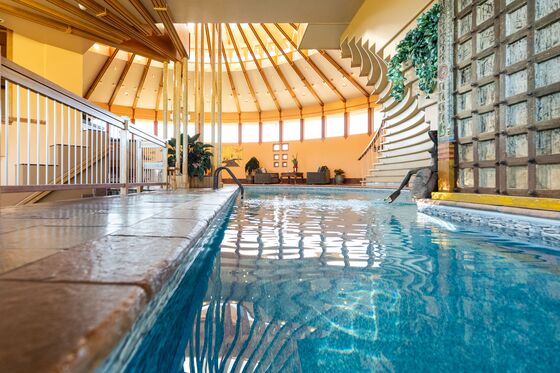 The Mansion That Chunky Monkey Built Has a Pool in the Foyer