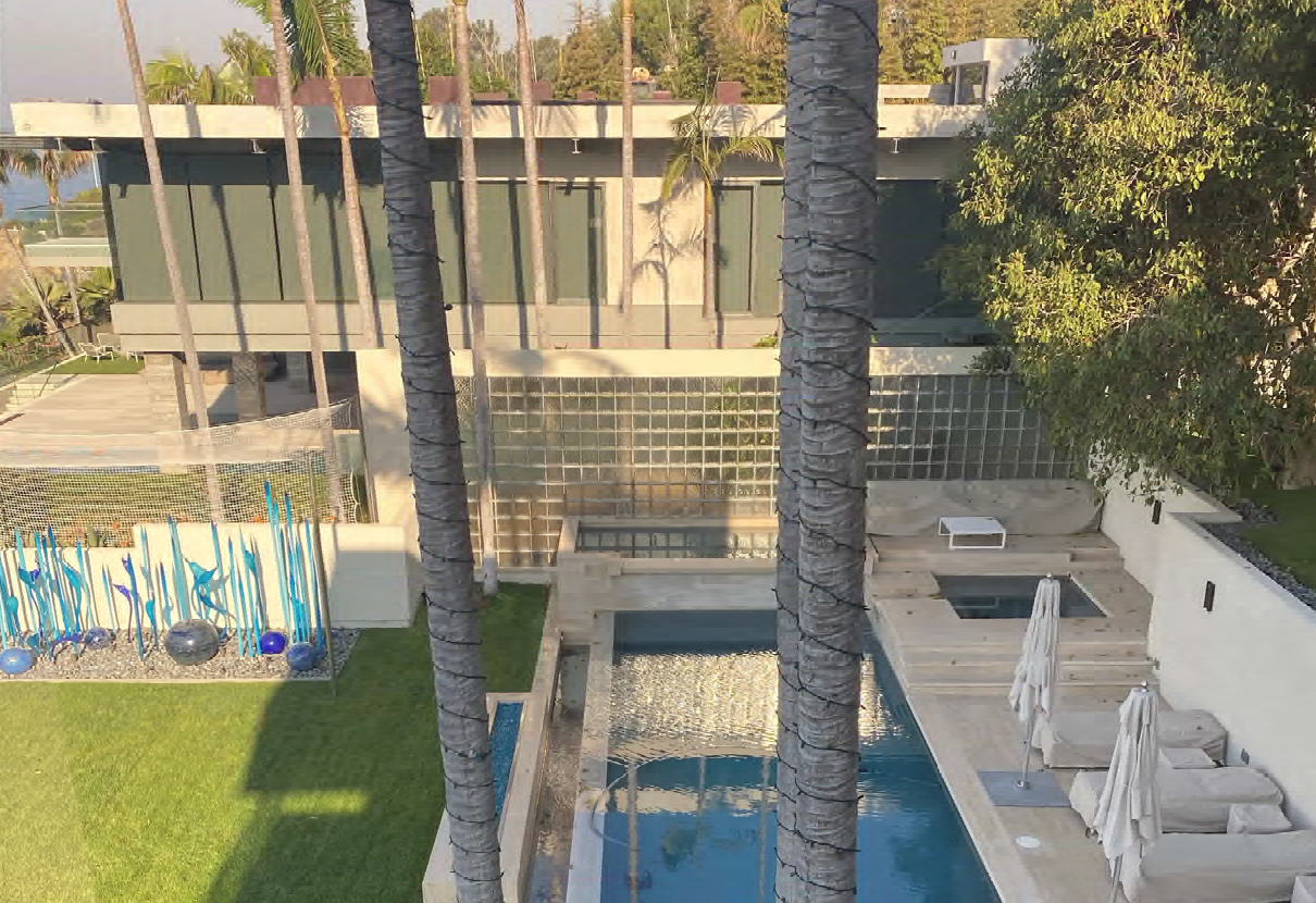 The netting over the Dale Chihuly sculpture, left, that Bill Gross and his partner installed at their Laguna Beach home,