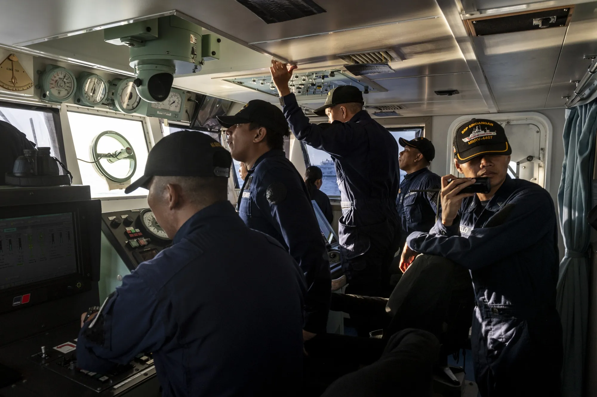 Philippine Coast Guard personnel onboard the BRP Sindangan during a resupply mission in the disputed Second Thomas Shoal in the South China Sea in November.&nbsp;