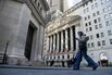 Traders At The New York Stock Exchange As Stocks, Bonds, Dollar Get Hit Amid US-Europe Clash