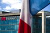 A French national flag hangs near the Huawei Technologies France SASU offices in Paris.