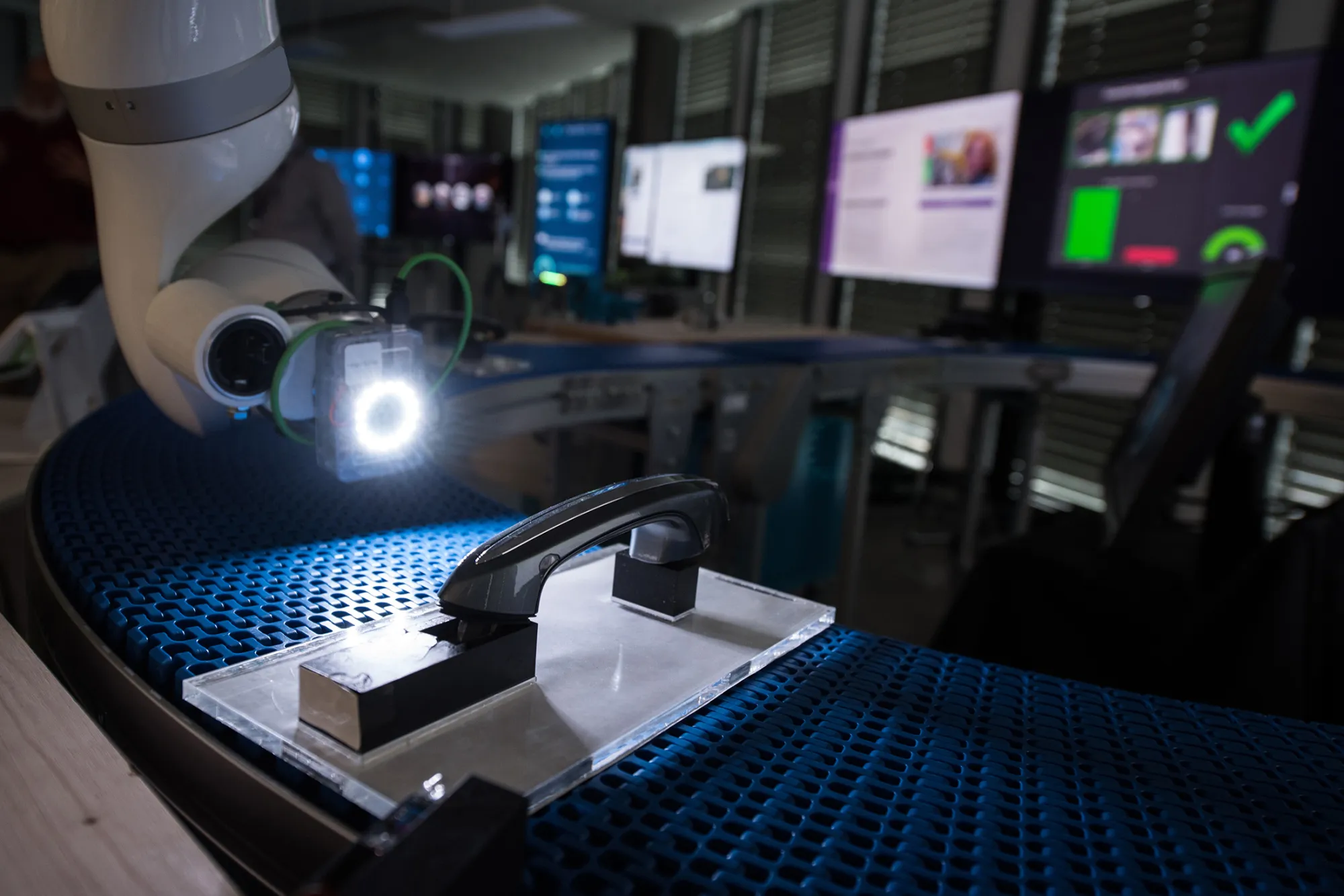 An IBM Visual Inspection system illuminates an automobile door handle at the International Business Machines Corp. (IBM) Watson cognitive computing platform IoT center in Munich, Germany, on Thursday, Aug. 10, 2017. IBM is revamping its Global Technology Services division, which helps customers run their computer networks, to rely more heavily on artificial intelligence.
