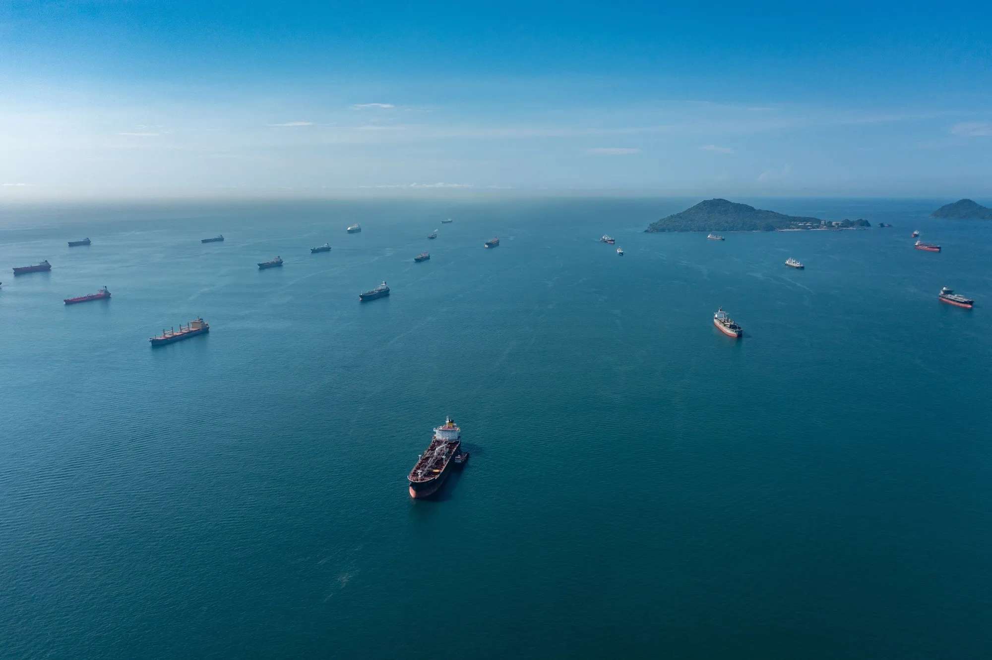 Cargo ships wait in the anchor zone to cross the Panama Canal on Sept. 1, 2023. Ships had&nbsp;been waiting for days as the congestion to cross increased due to intense droughts during the rainy season.