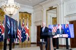 President Joe Biden, center, Scott Morrison, left, and Boris Johnson speak via videoconference on Sept. 15.