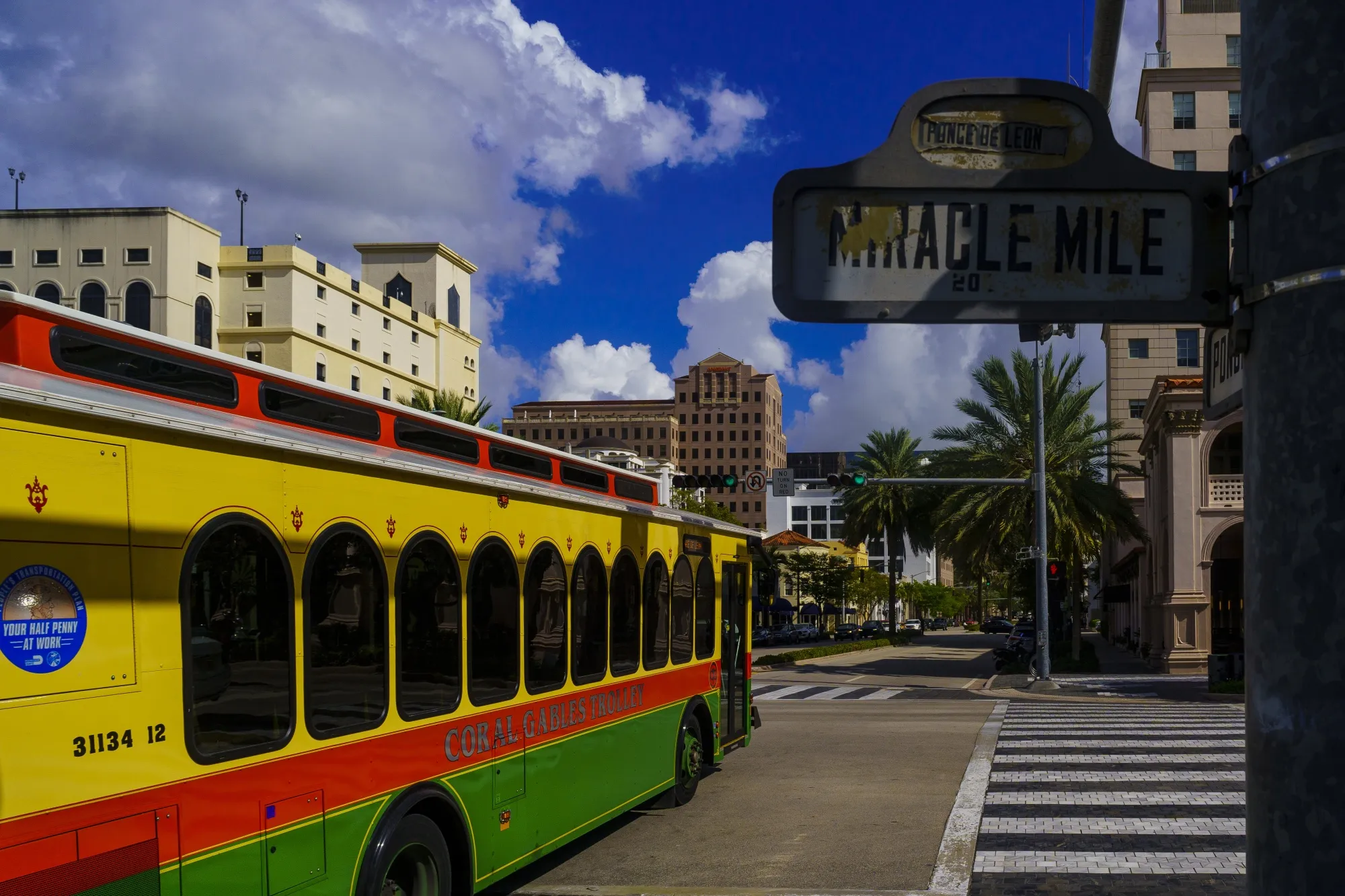 A trolley travels through the Miracle Mile Coral Gables shopping district in downtown Coral Gables, Florida, US, on Thursday, Sept. 1, 2022.&nbsp;
