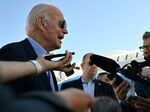 Joe Biden speaks to reporters before boarding Air Force One at Dover Air Force Base in Delaware, on Aug. 8. 