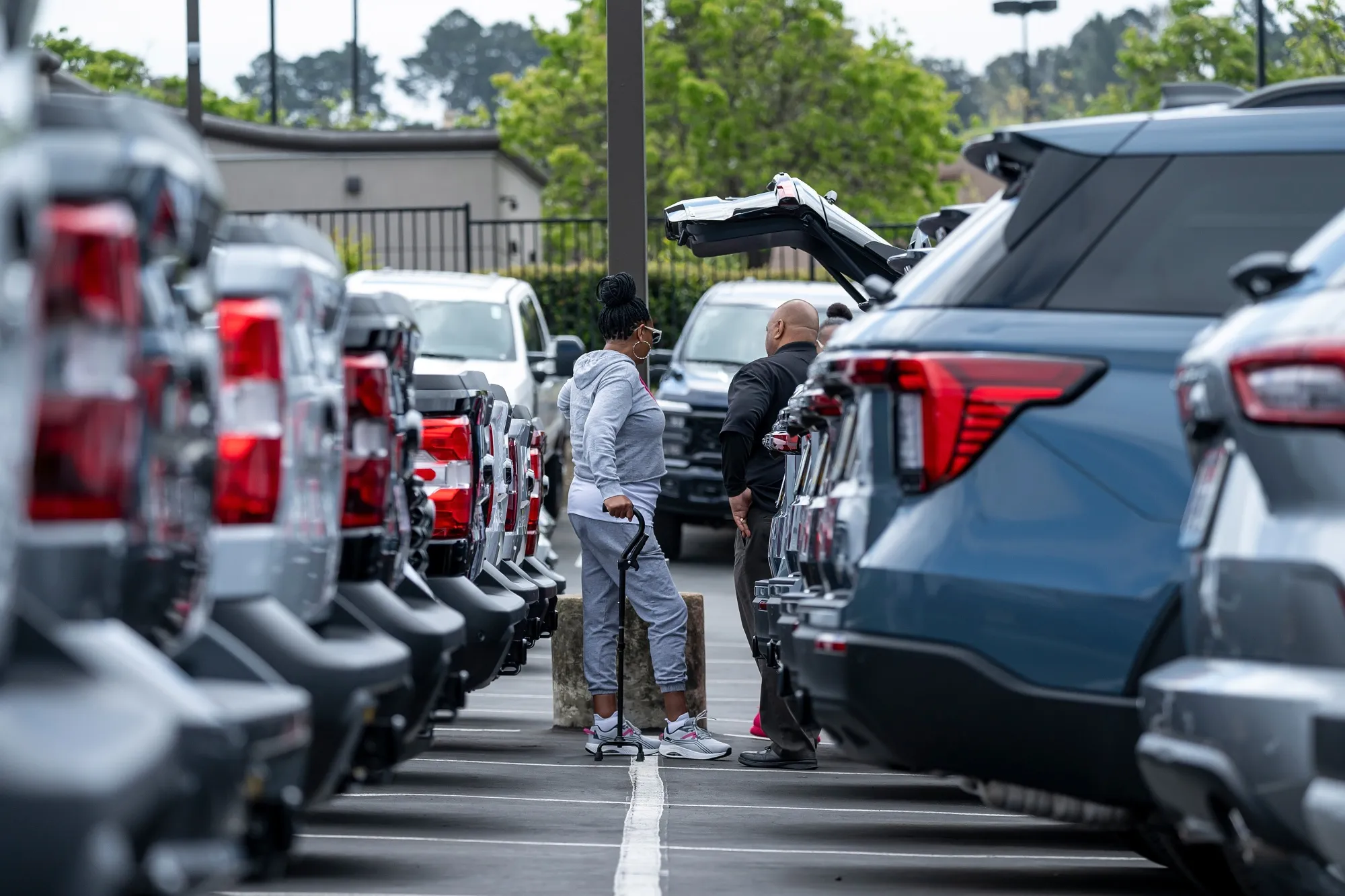 Customers at a car&nbsp;dealership in Richmond, California.