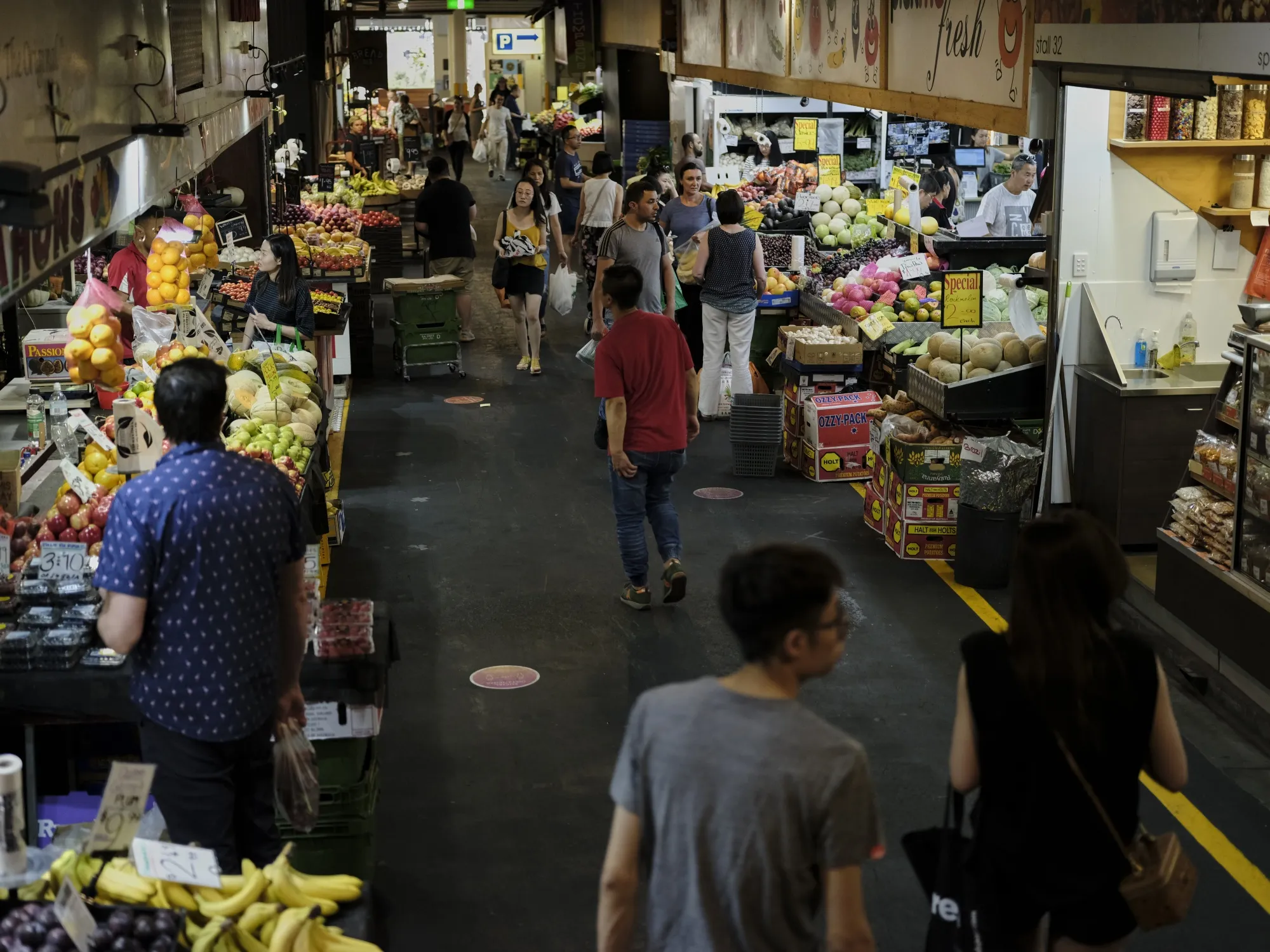 Shoppers inside the Adelaide Central Market.