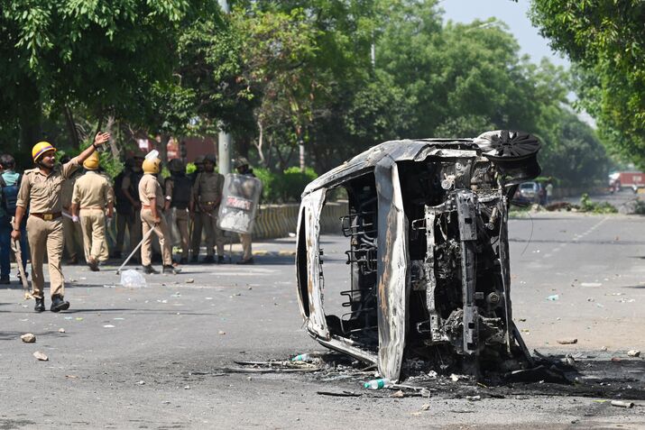 Workers Protest Over Wage Hike Turns Violent In Noida