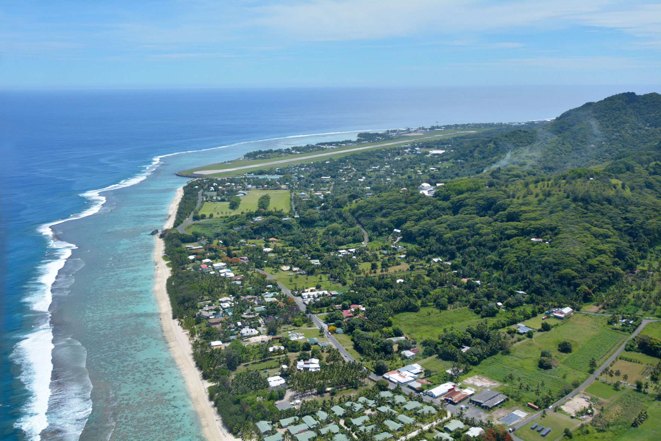 Aerial view of Arorangi village looking to the north, Rarotonga coral atoll, and Rarotonga International Airport.&nbsp;
