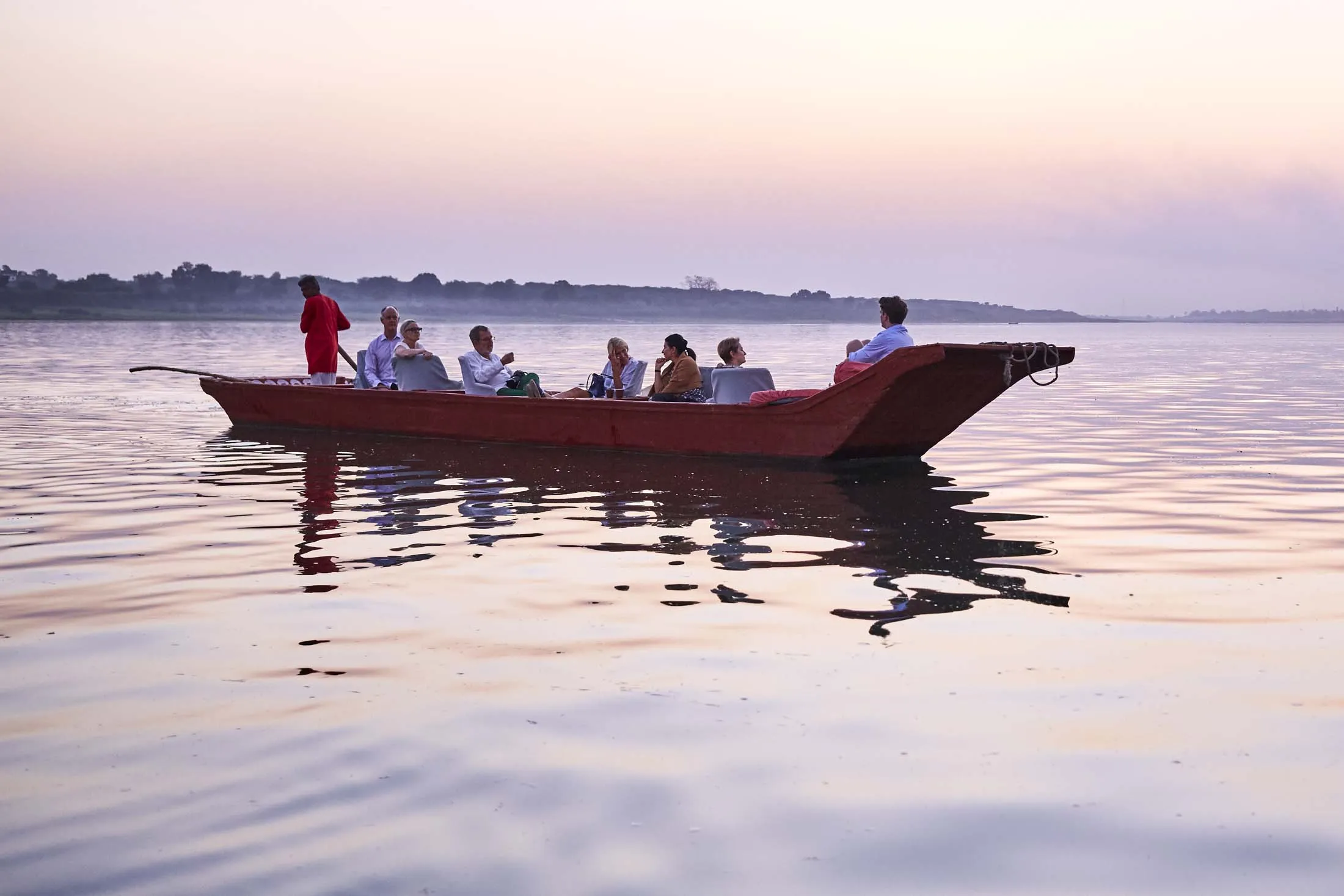 Prior members on a boat in Maheshwar Ahiyla Fort in central India.