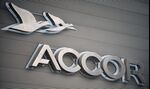 The Accor SA logo is seen outside the company's headquarters in Paris, France, on Wednesday, Feb. 23, 2011. Accor SA, Europe's largest hotelier, said it will accelerate an asset-disposal plan to cut adjusted net debt by 1.2 billion euros ($1.6 billion) this year and next.