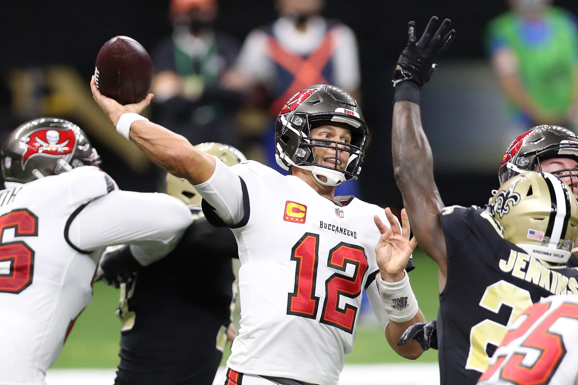 NEW ORLEANS, LOUISIANA - SEPTEMBER 13: Tom Brady #12 of the Tampa Bay Buccaneers throws against the New Orleans Saints during the third quarter at the Mercedes-Benz Superdome on September 13, 2020 in New Orleans, Louisiana. (Photo by Chris Graythen/Getty Images)