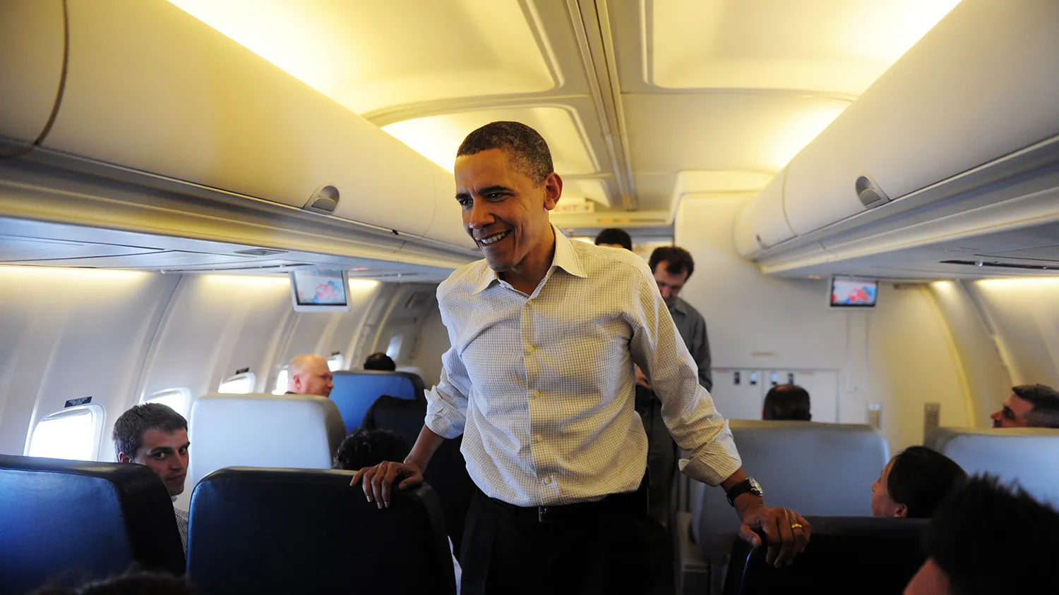 US President Barack Obama speaks with traveling journalists on board Air Force One on April 28, 2010.
