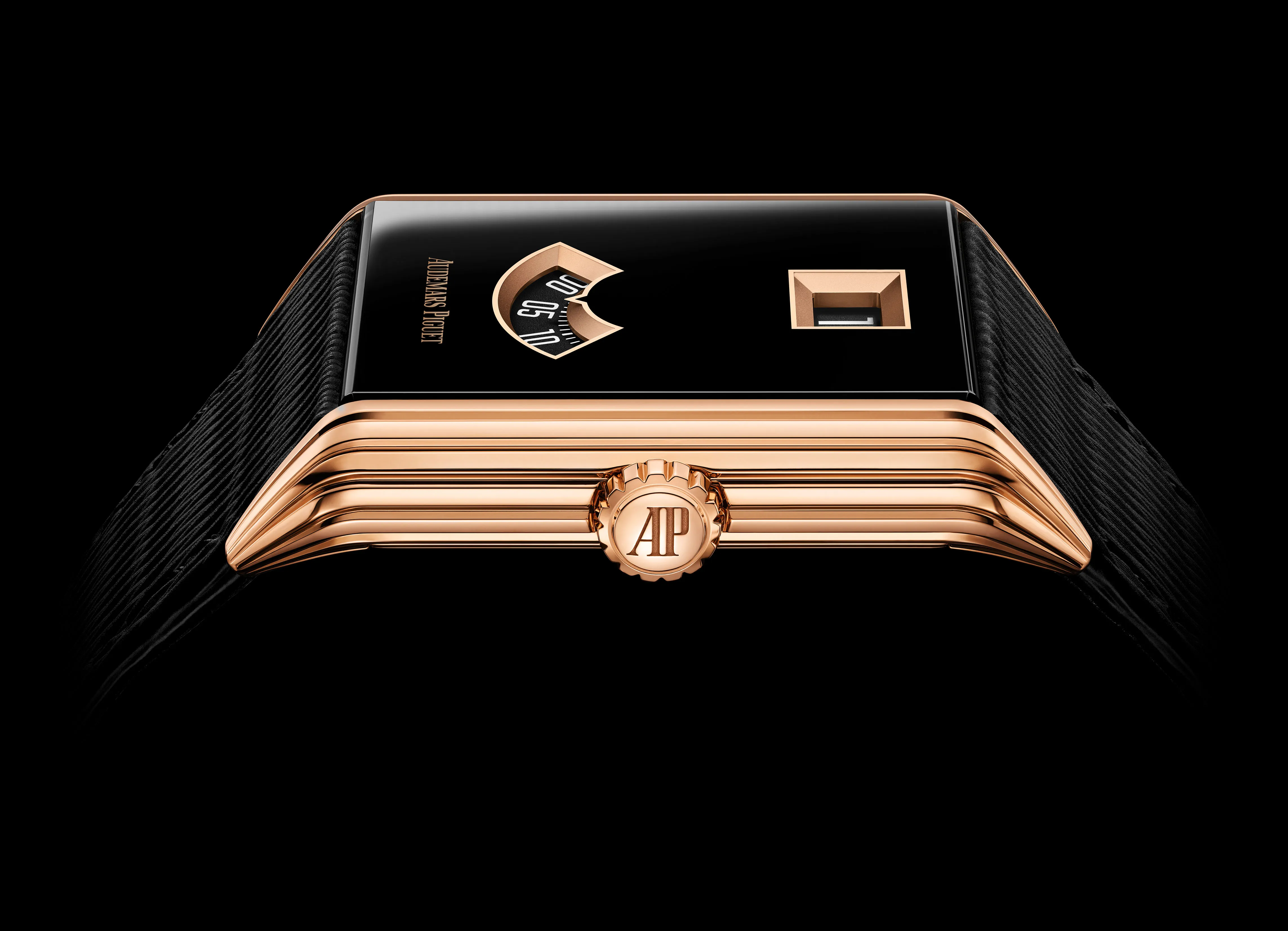 The Audemars Piguet Neo Frame Jumping Hour comes in rose gold with a sapphire face coated by black PVD.