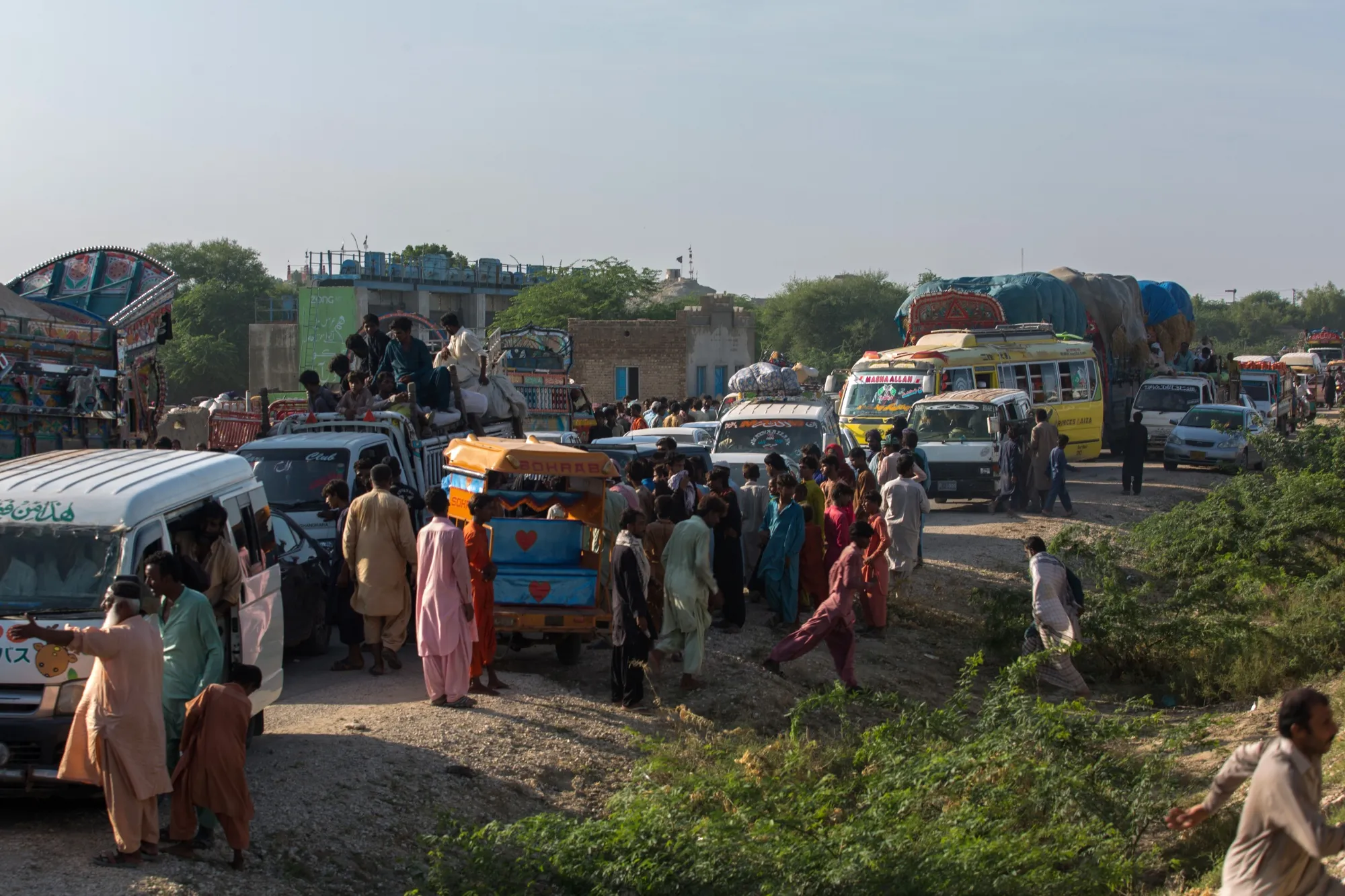 Traffic halts as people affected by floods block the Indus Highway in protest, demanding food and shelters, in Pakistan’s Sindh province in&nbsp;August 2022.