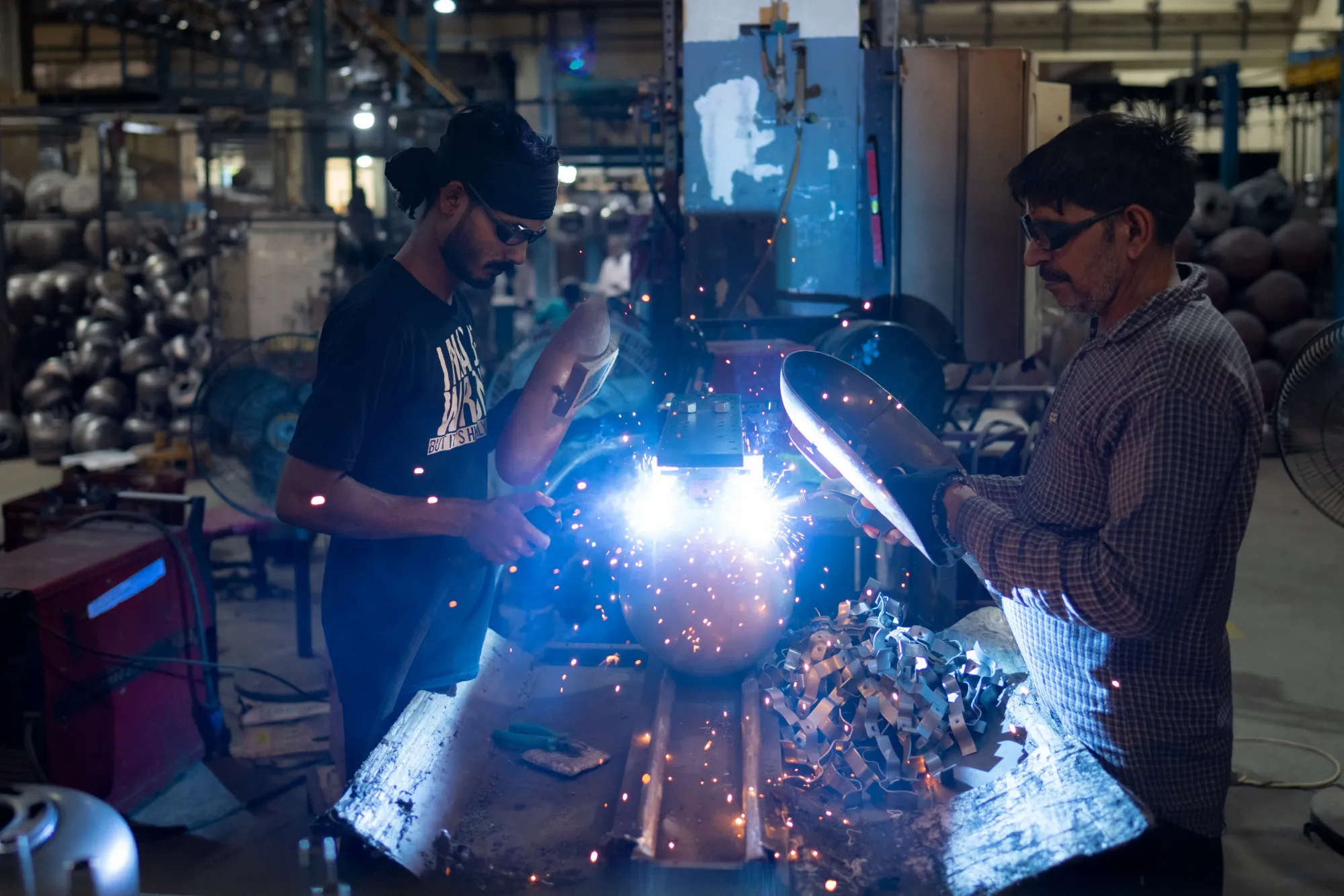Employees on the production line of water heaters at a Marc Enterprises Pvt. facility in Sonepat, India, on Saturday, Aug. 24, 2024. India is scheduled to release gross domestic product (GDP) figures on Aug. 30.