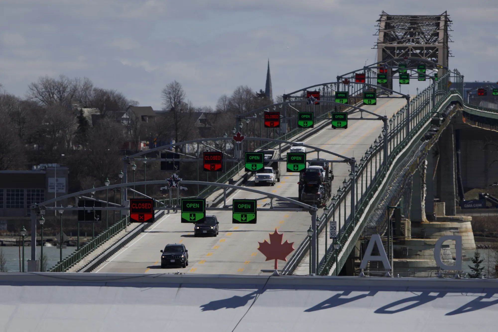 Traffic moves along the Peace Bridge between Canada and the U.S. in Fort Erie, Ontario on March 21.&nbsp;