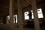 Contractors work on a new home under construction in Dunlap, Illinois, U.S., on Wednesday, March 30, 2016.